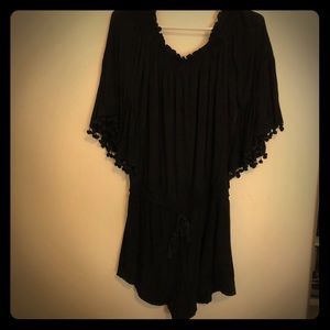 Black romper w Pom Pom tassels from Anthropologie